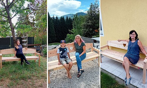 Die Gewinner_innen sitzend auf der Gartenbank.